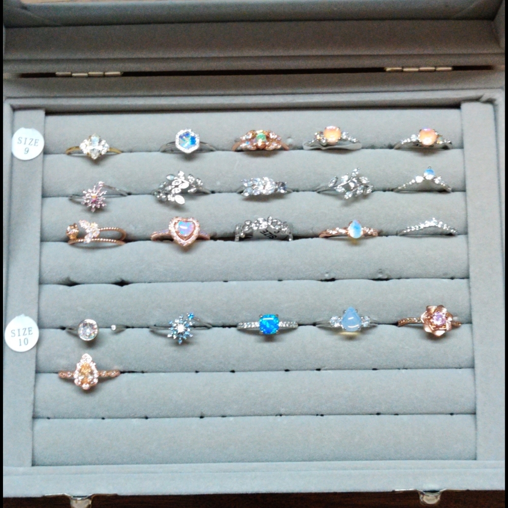 Multiple Fragrant Jewels rings in display case